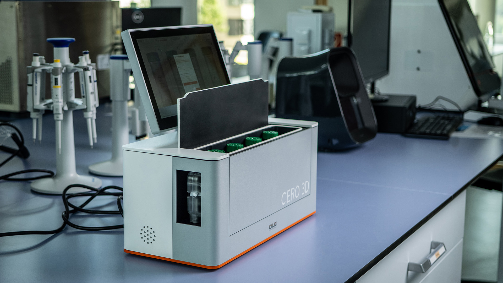 CERO 3D bioreactor with open lid on a laboratory bench